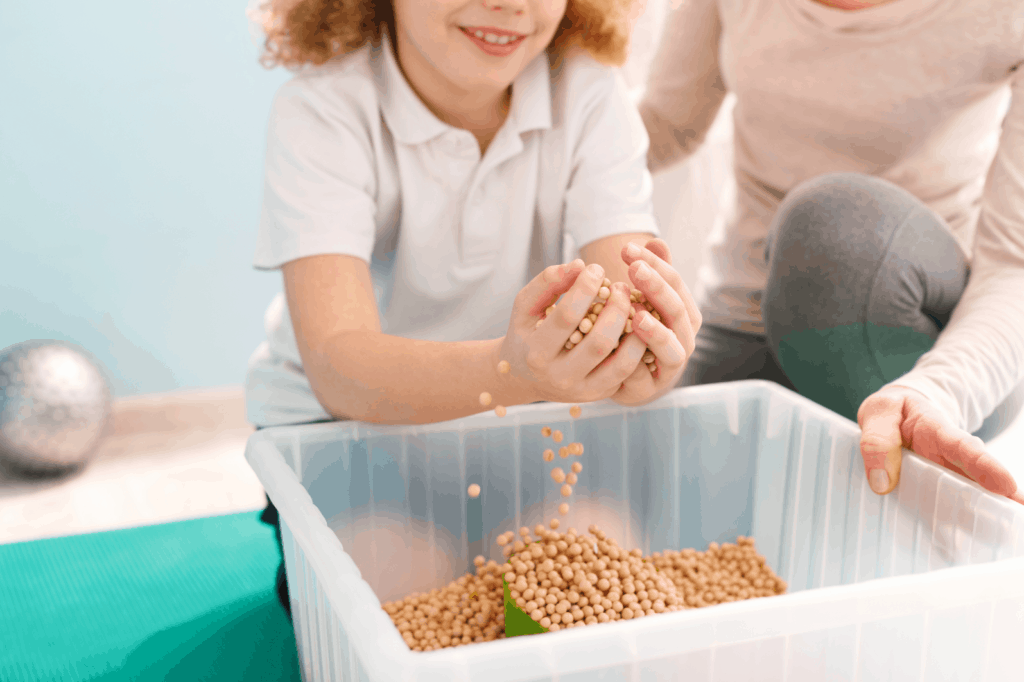 kid using a sensory bin