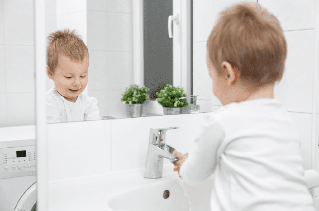 Boy Washing His Hands - Montessori Bathroom Self Care