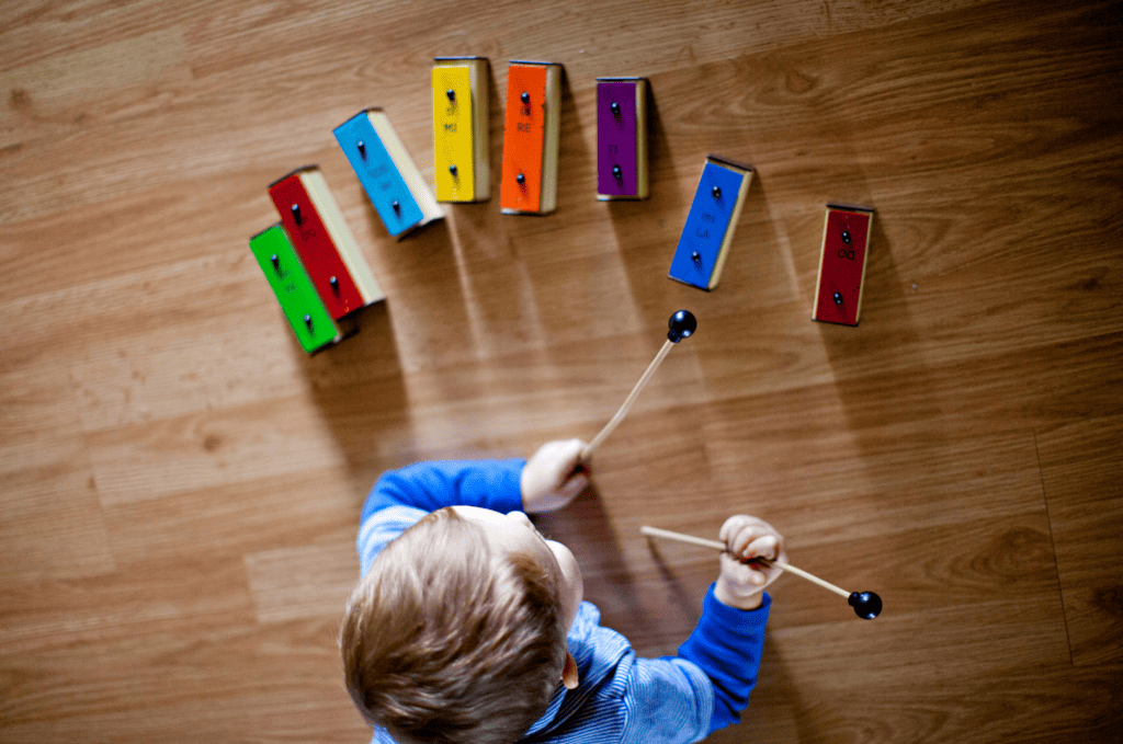 child playing music