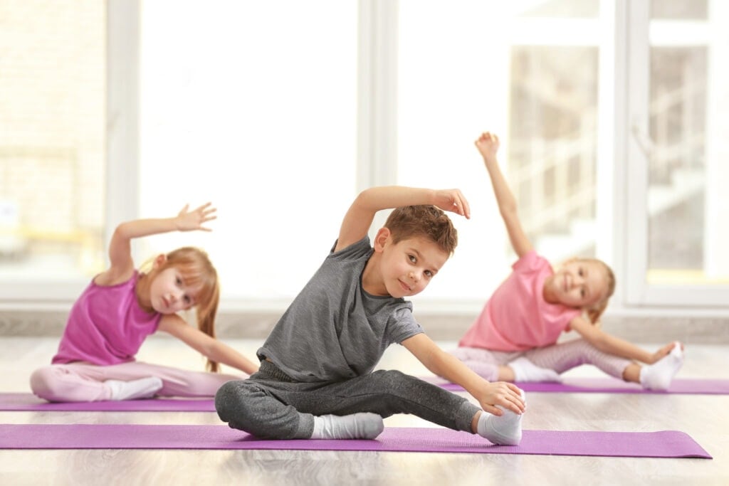 Kids practicing yoga and mindfulness