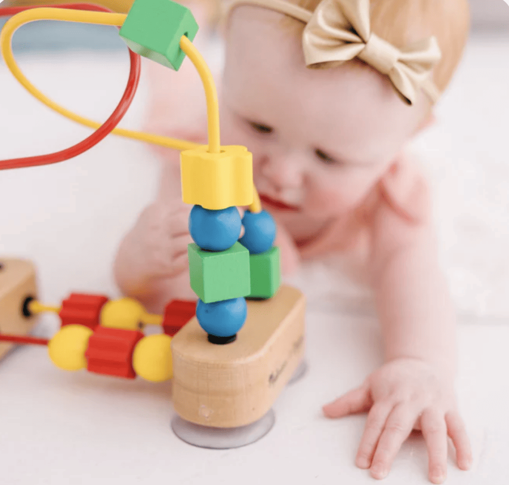 Melissa and Doug Wooden Bead Maze on a suction cup base for babies Montessori aligned toy