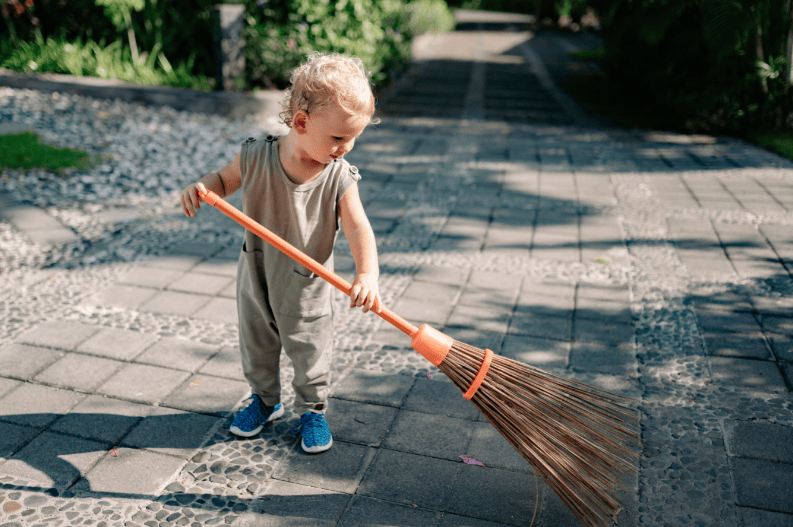 Toddler sweeping